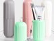 Travel toothbrush case and toothpaste holder with rinse cup, grey