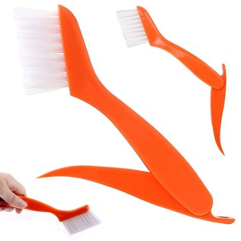 Groove and crevice cleaning brush with detachable scraper