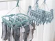 Compact clothes drying rack with 32 clips for socks and underwear, blue