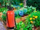Hand pressure garden sprayer with long lance, 8L, shoulder strap, orange