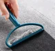 Compact handheld lint remover brush for clothes and upholstery, blue