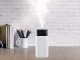 Ultrasonic air humidifier with star projector and night light