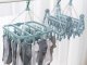 Compact clothes drying rack with 32 clips for socks and underwear, blue