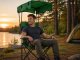 Folding camping chair with canopy and cup holder, green