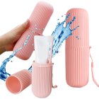 Travel toothbrush and toothpaste case with rinse cup, pink