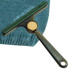 Double-sided brush roller for pet hair removal from carpets and upholstery