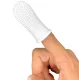 Silicone toothbrush for brushing the teeth of a dog cat transparent