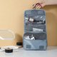 Travel toiletry bag with roll-up design, grey