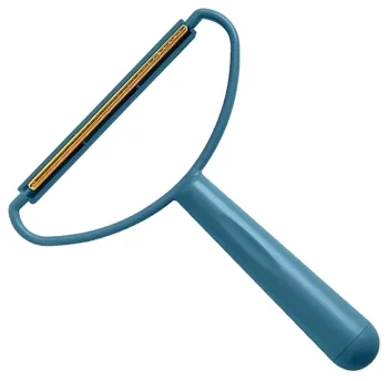 Compact handheld lint remover brush for clothes and upholstery, blue