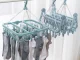 Compact clothes drying rack with 32 clips for socks and underwear, blue