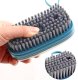 Cleaning brush with liquid dispenser, silicone bristles, blue