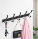 Wall-mounted clothes rack, black