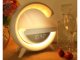 RGB LED desk lamp with Bluetooth speaker, FM radio, alarm clock and 15W wireless charger