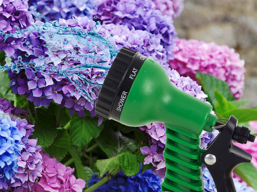 Garden hose spray gun with 7 functions, green (1)