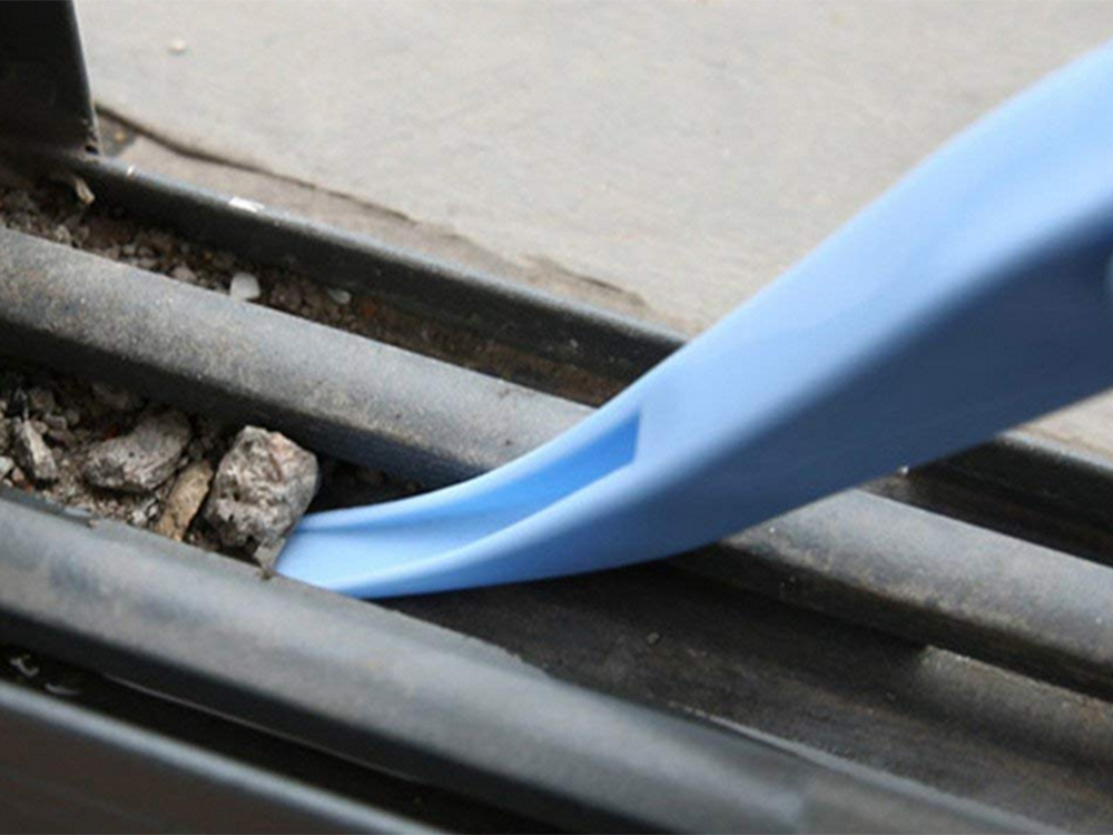 Crevice and Groove Cleaning Brush with Scraper